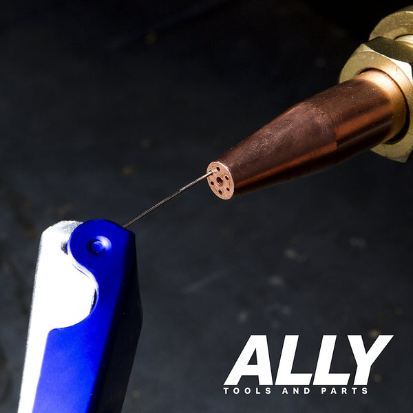 Torch Tip Cleaning Tool in Action